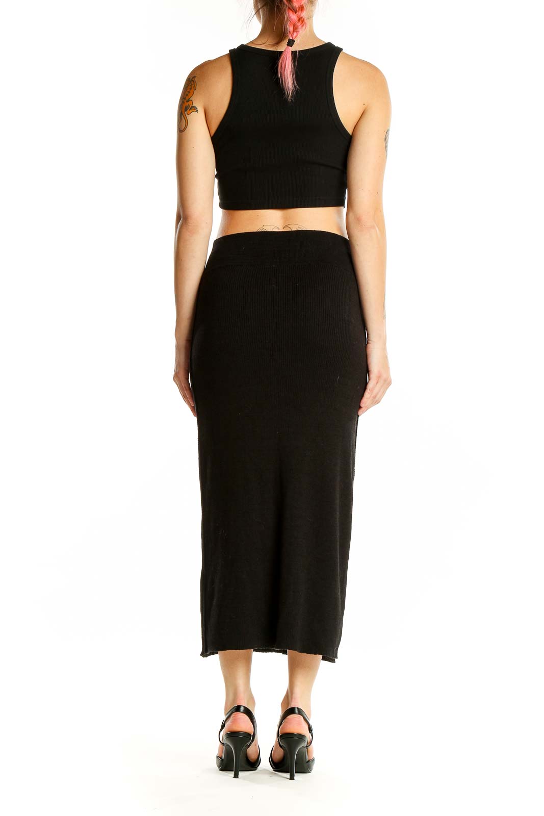 Back view of Free People Black Ribbed Cotton Midi Skirt on model