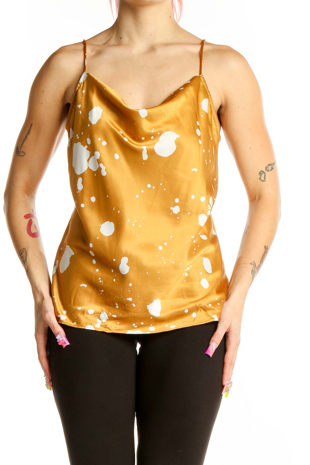 Front view of Nine West golden camisole with white splatter print