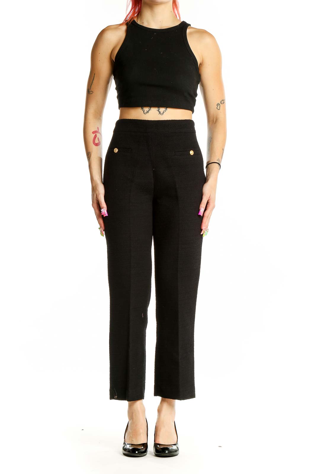 Front view of Zara black high-waisted tailored trousers with gold button accents