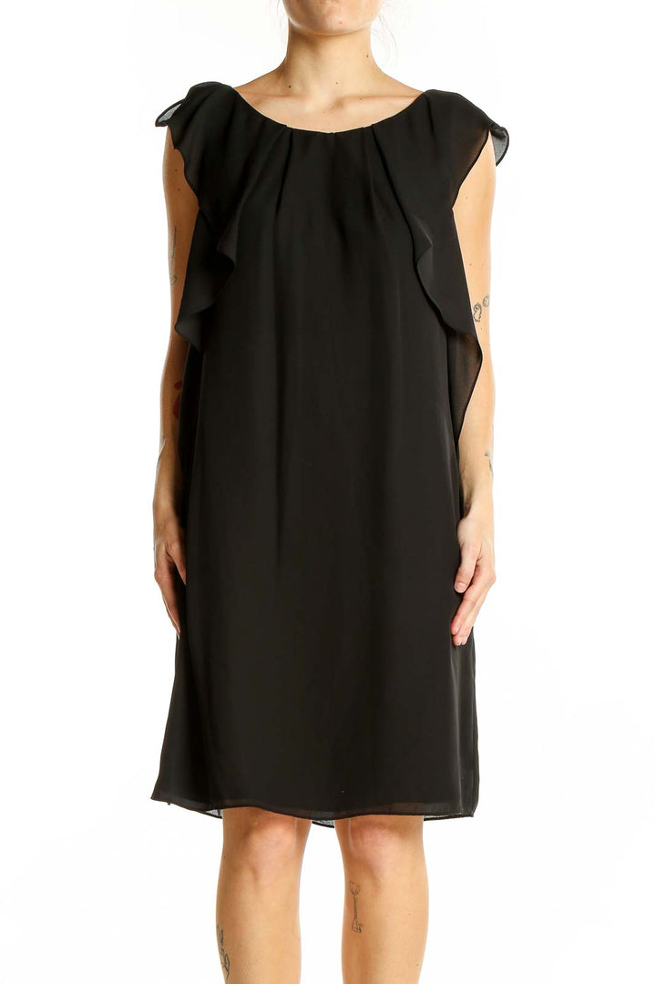 Front view of black Vince Camuto cocktail dress with ruffled cap sleeves