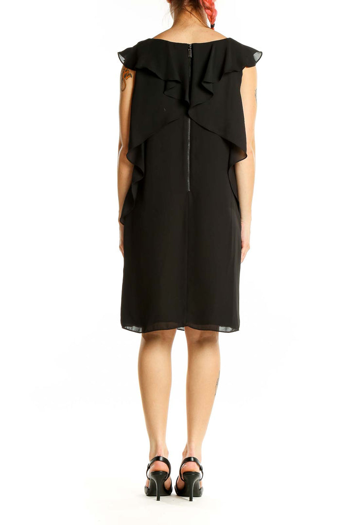 Back view of black Vince Camuto cocktail dress showing keyhole closure