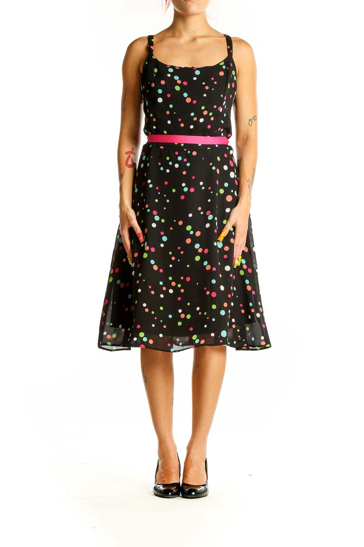 Front view of K & Company black polka dot sleeveless dress with hot pink belt