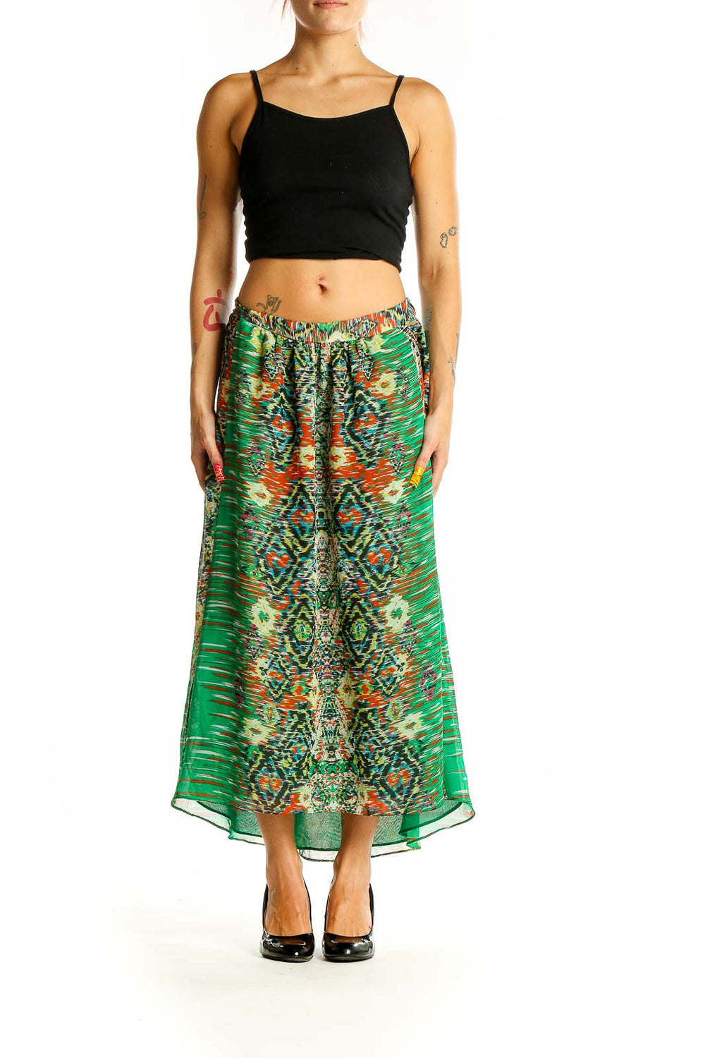 Front view of green patterned INC maxi skirt with abstract design