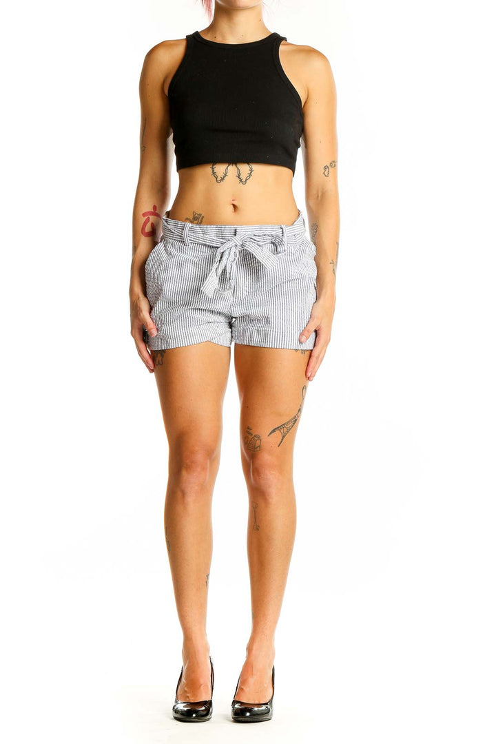 Front view of Banana Republic gray striped high-waisted shorts with self-tie belt