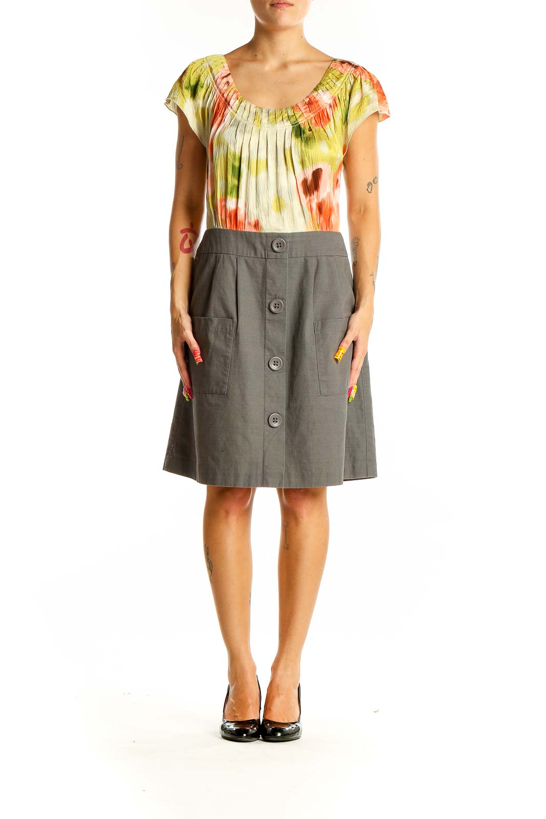 Front view of Tabitha multicolor floral pleated bodice dress with olive green button-front skirt