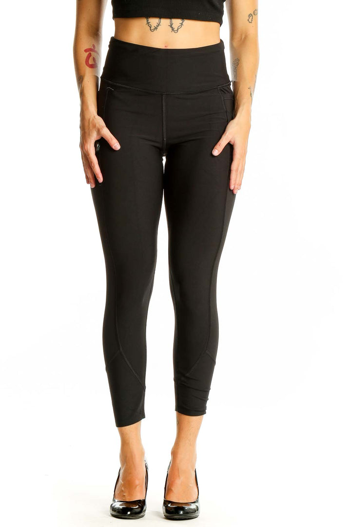 Front view of black high-waisted cropped activewear leggings from Victoria's Secret