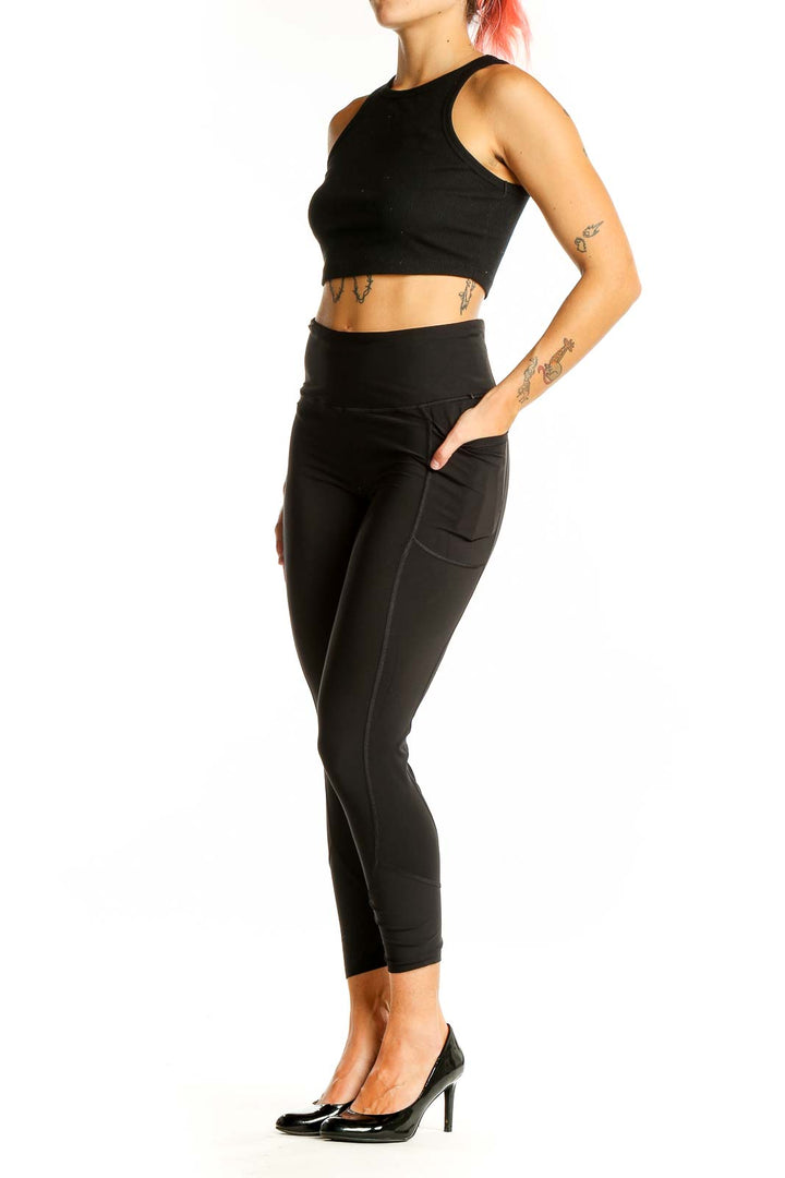 Front view of black high-waisted cropped activewear leggings from Victoria's Secret