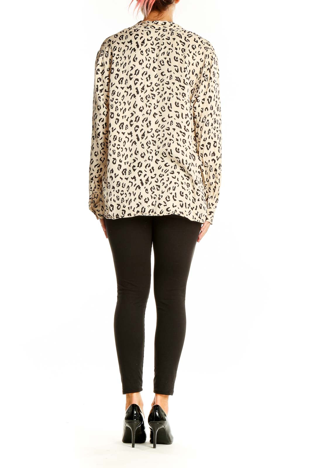 Back view of Zara beige leopard print blouse on model