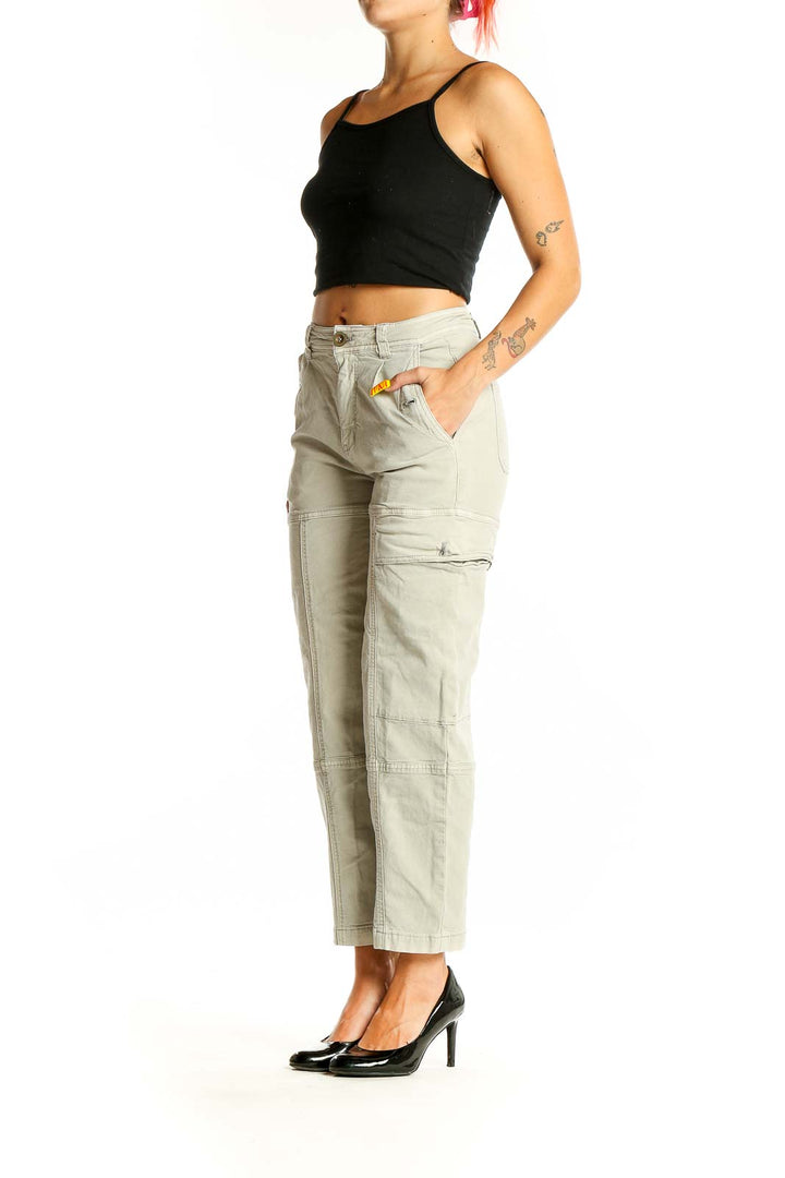 Front view of Anthropologie beige high-waisted cargo pants