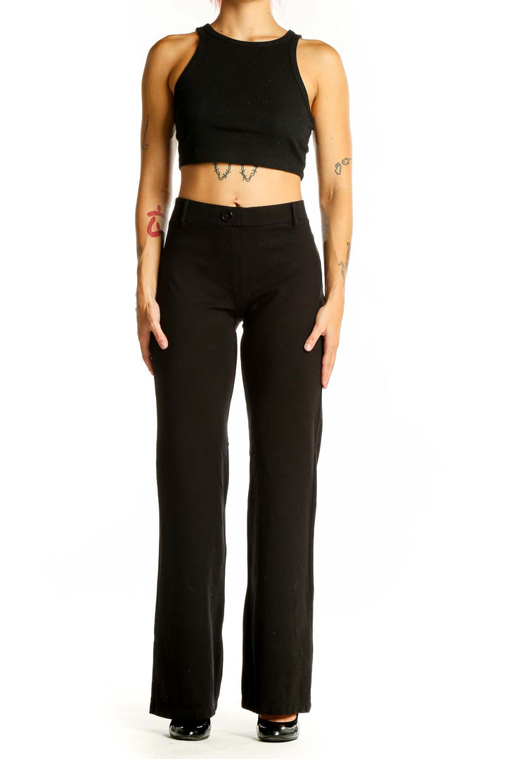 Front view of Betabrand black wide-leg dress pants on model