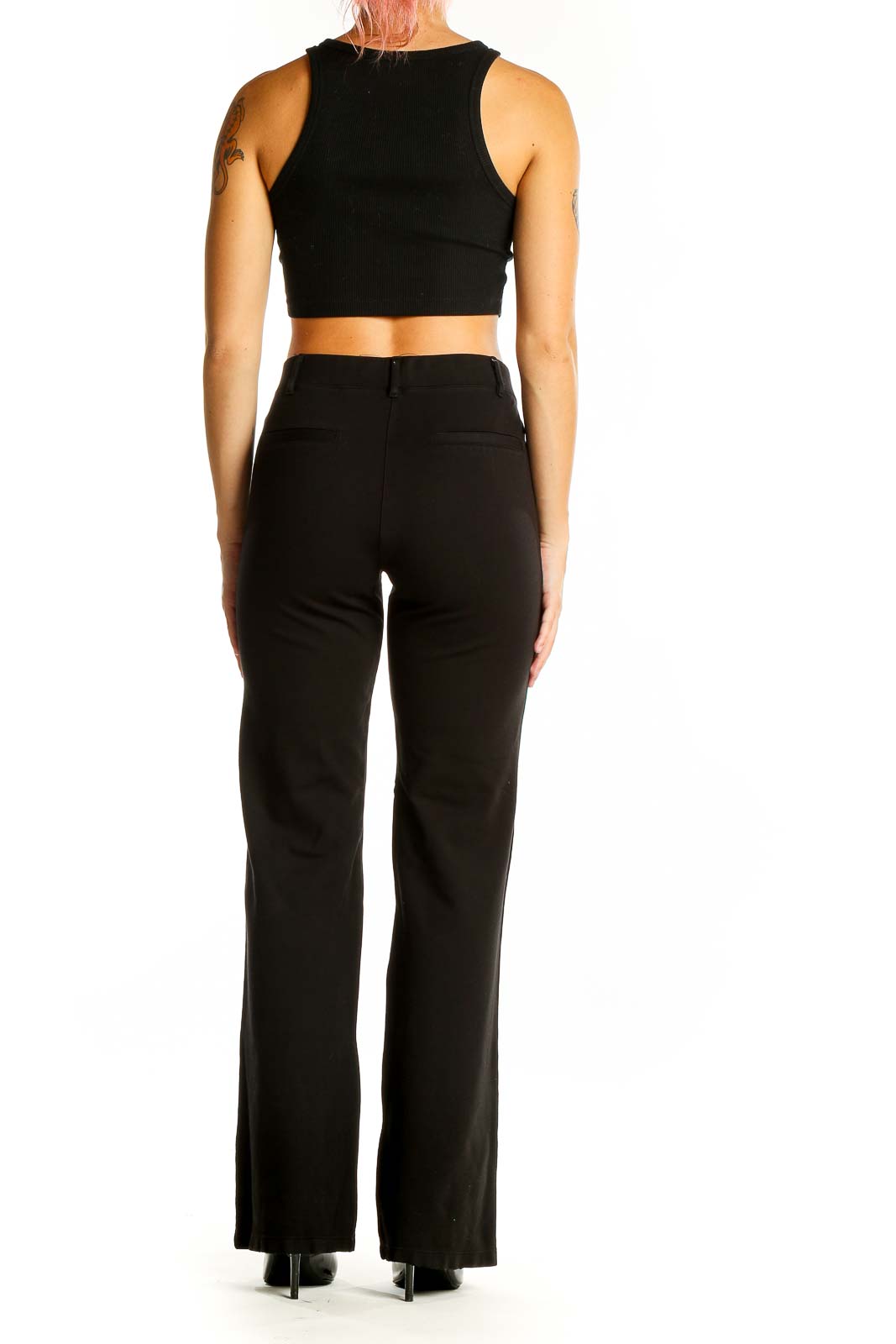 Back view of Betabrand black wide-leg dress pants on model