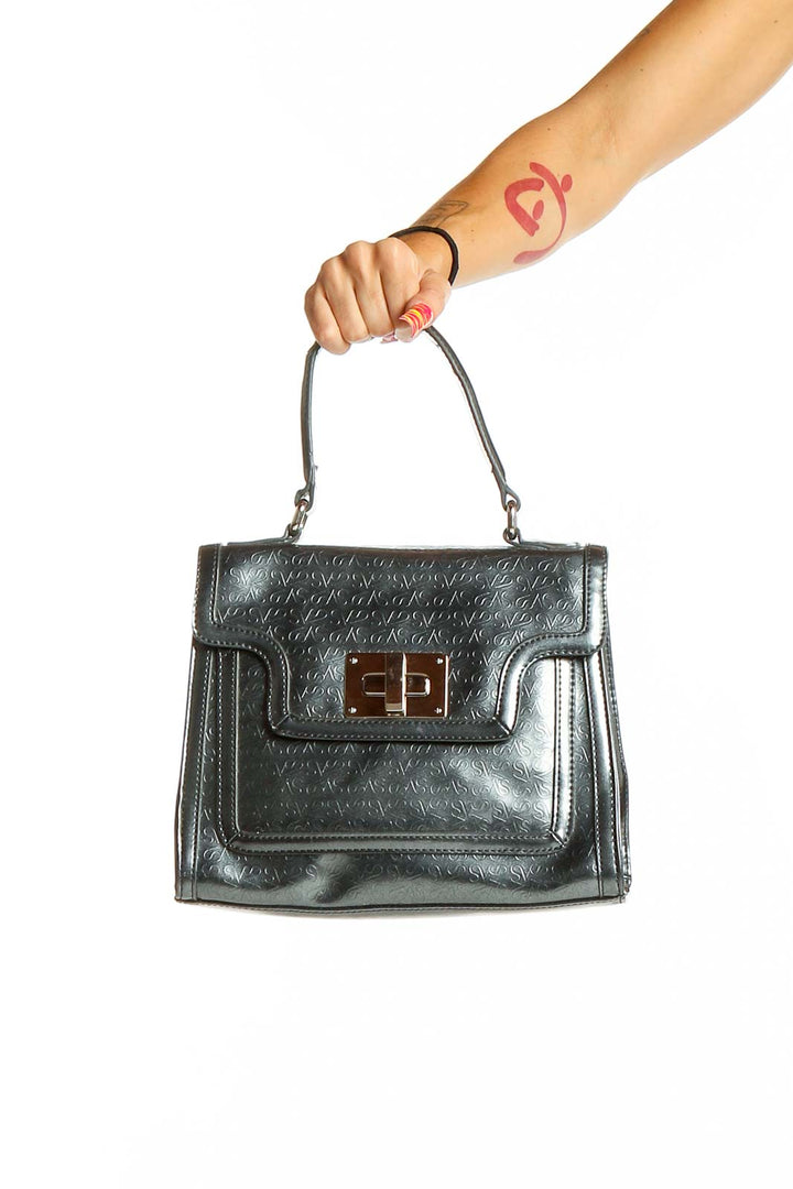 Front view of metallic gray SilkRoll satchel with gold-tone turn-lock closure