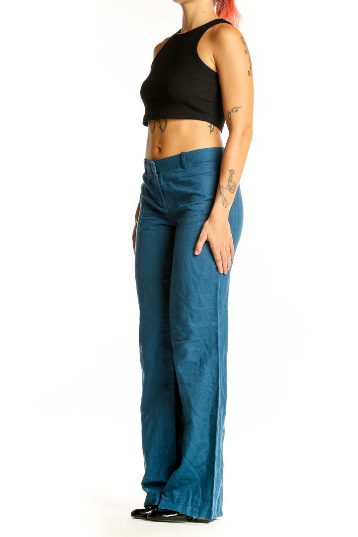 Front view of BCBG MaxAzria teal wide-leg pants with high-rise waist