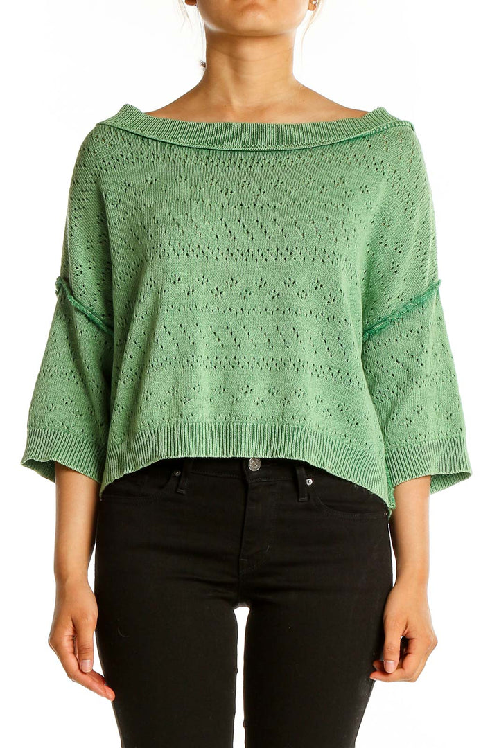 Front view of green crochet knit off-shoulder top from Free People