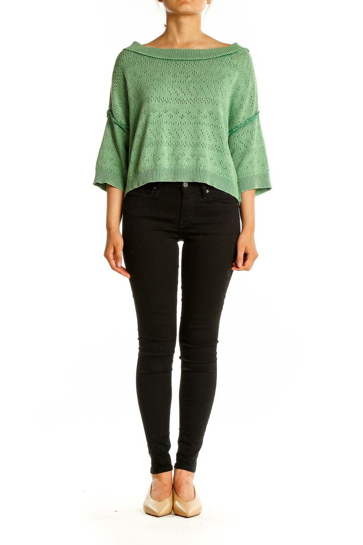 Front view of green crochet knit off-shoulder top from Free People