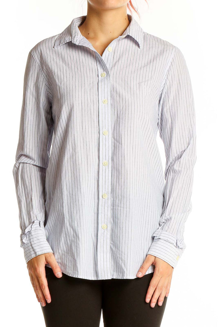 Front view of Banana Republic white pinstriped cotton button-up shirt on model