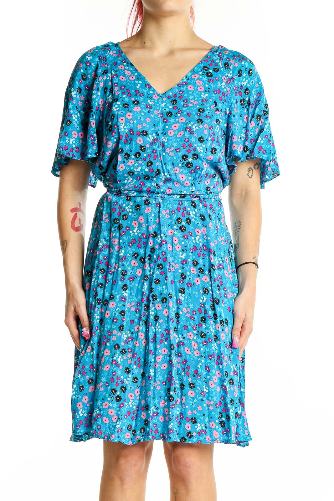 Front view of Calvin Klein blue floral flutter sleeve dress with V-neck