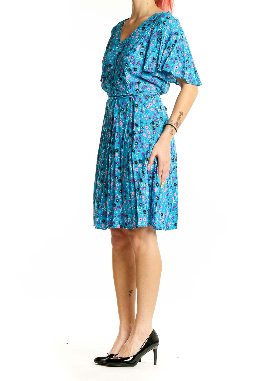 Front view of Calvin Klein blue floral flutter sleeve dress with V-neck