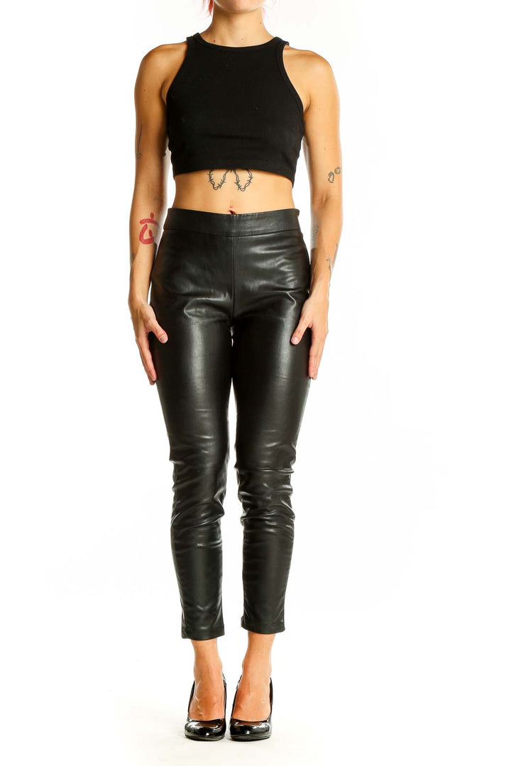 Front view of Ann Taylor black faux leather slim-fit pants