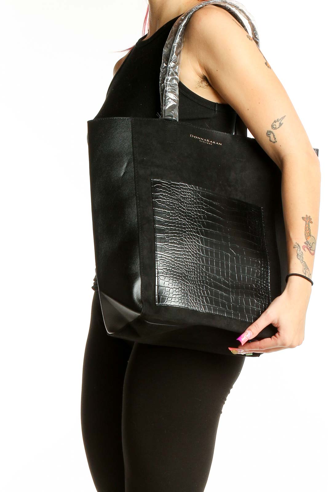 Front view of Donna Karan New York black tote bag with croc-embossed panel