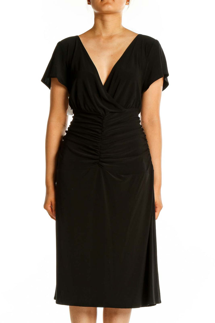 Front view of black Spago midi dress with V-neck and ruched waist