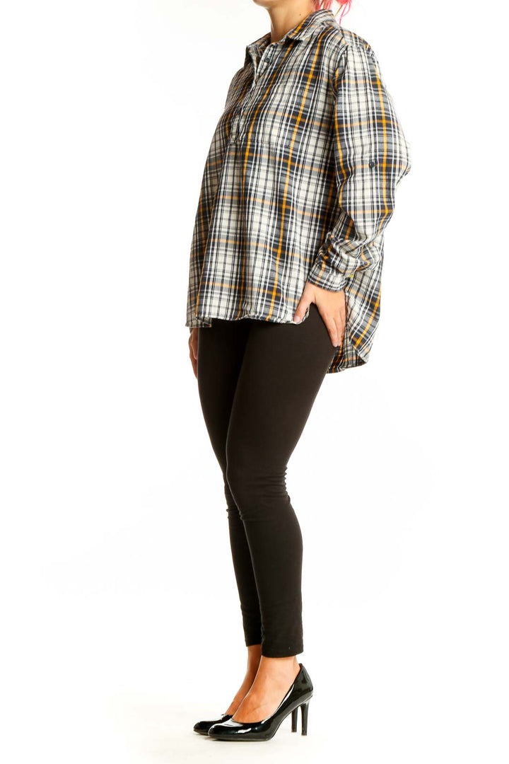 Front view of The North Face white and yellow plaid cotton shirt