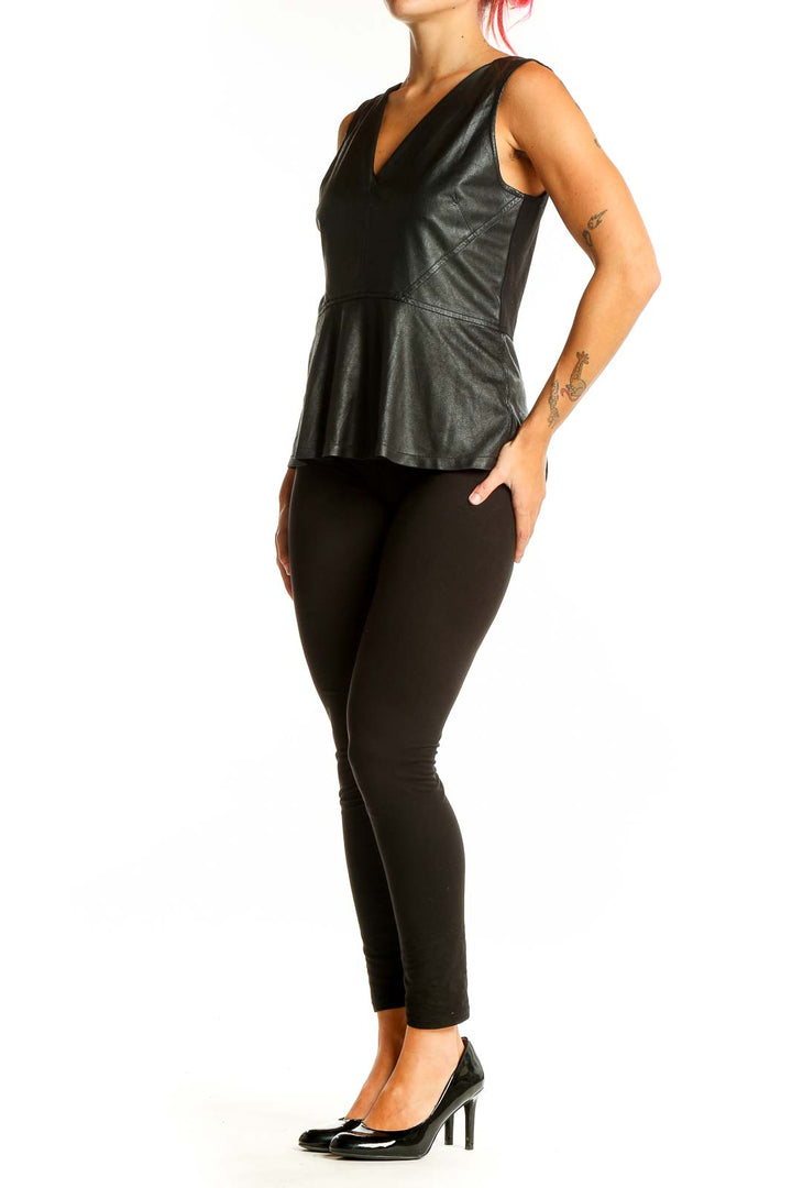 Front view of Sanctuary black leather peplum top with V-neckline