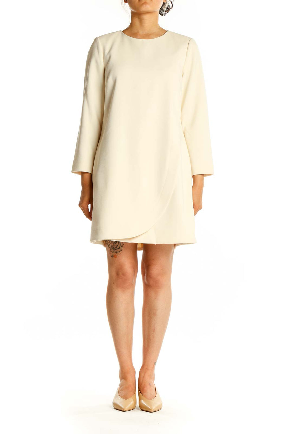 Front view of J.Crew cream shift dress with long sleeves