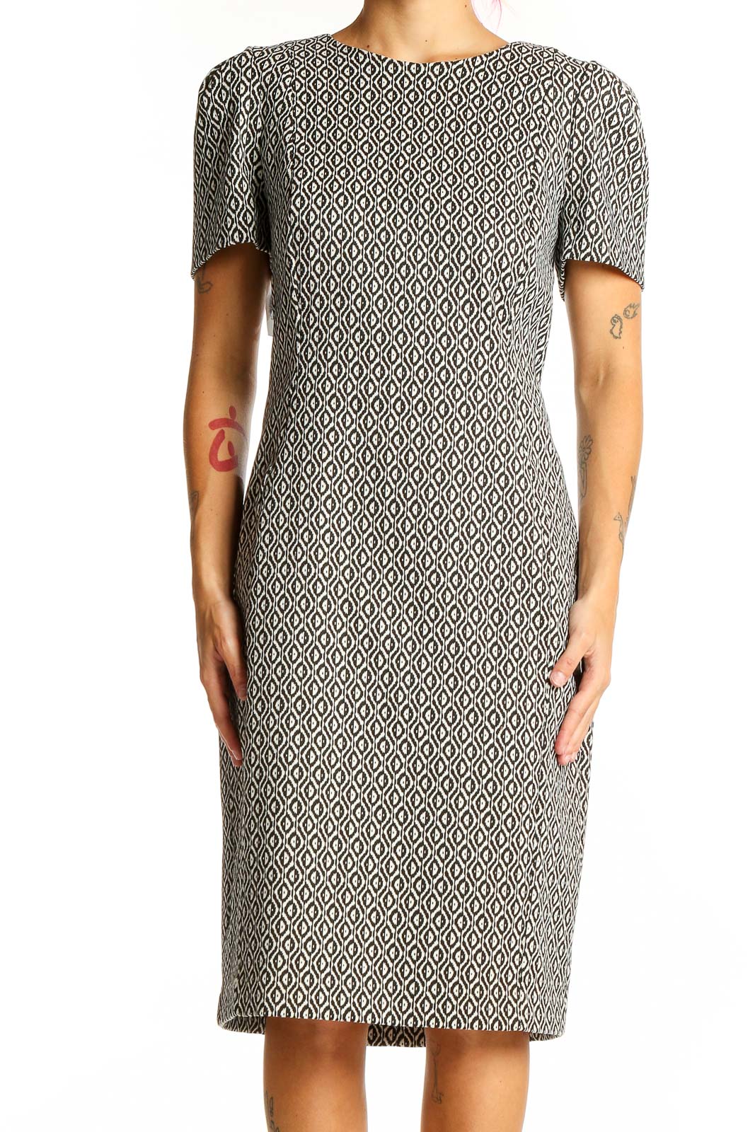 Front view of Calvin Klein black and white geometric sheath dress