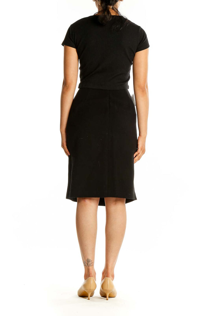 Back view of Anne Klein black pencil skirt showing fit and length