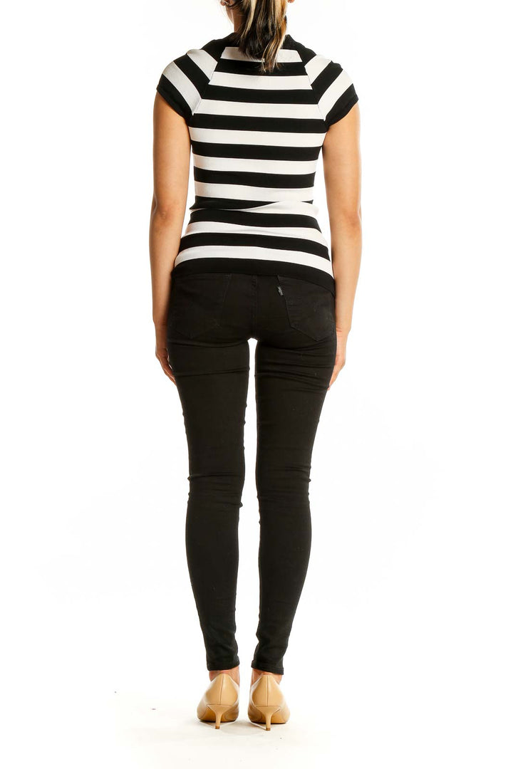 Back view of Black and White Striped Cap Sleeve Top showing fitted silhouette