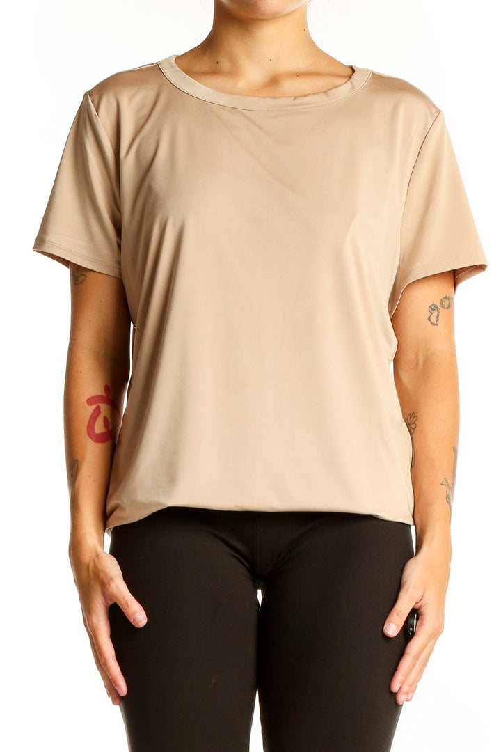 Front view of beige Express short-sleeve top with relaxed fit