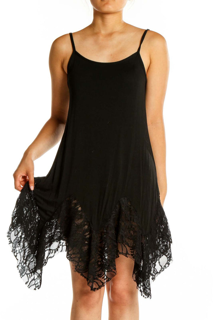 Front view of Oddy black slip dress with lace-trimmed handkerchief hem