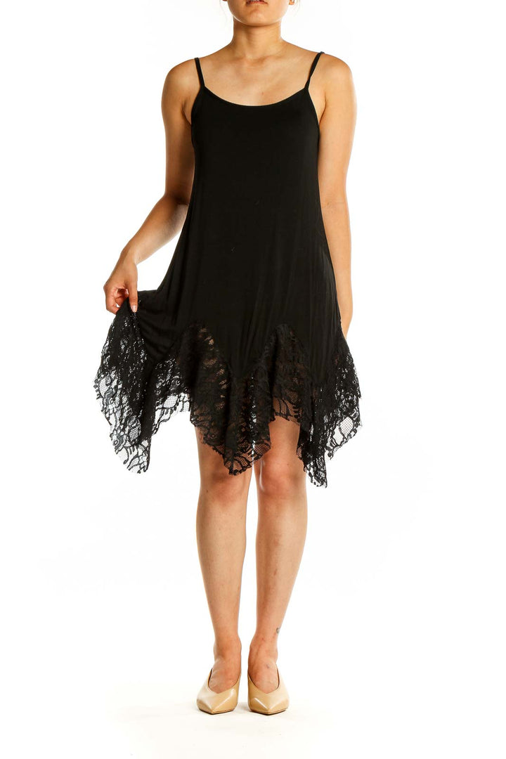 Front view of Oddy black slip dress with lace-trimmed handkerchief hem