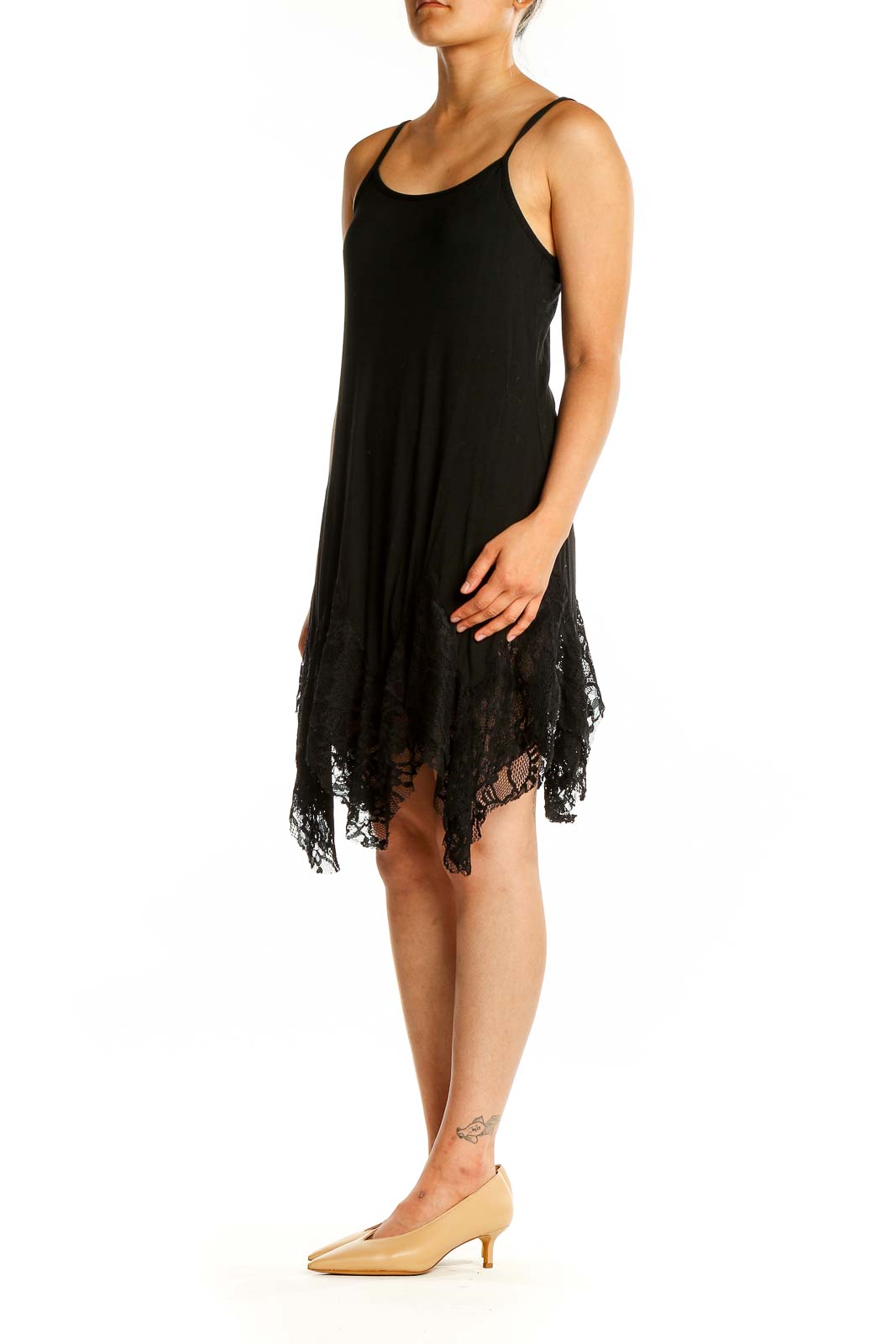 Front view of Oddy black slip dress with lace-trimmed handkerchief hem