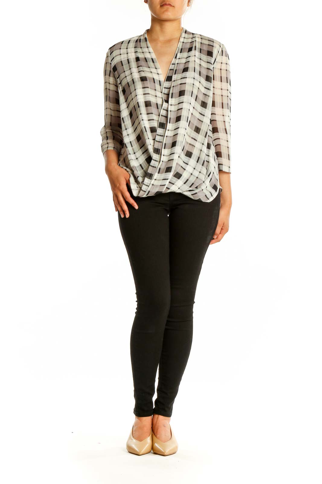 Front view of Babaton white and brown plaid silk blouse with wrap-style front