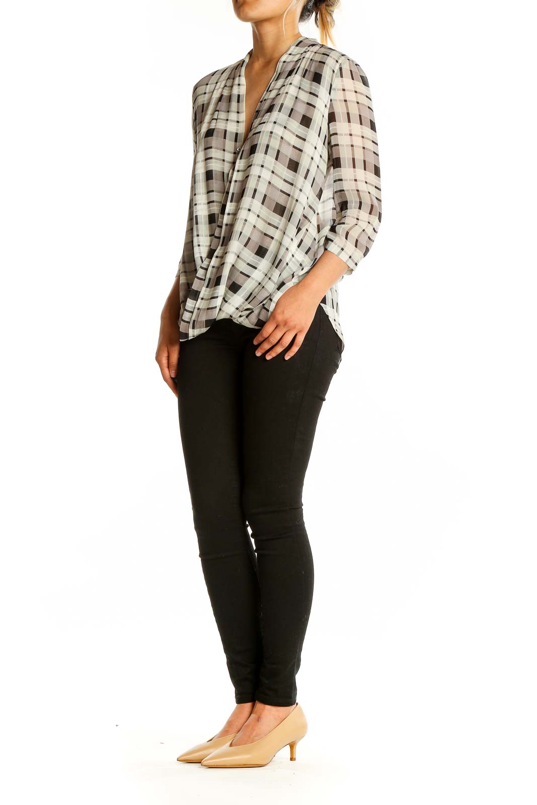 Front view of Babaton white and brown plaid silk blouse with wrap-style front