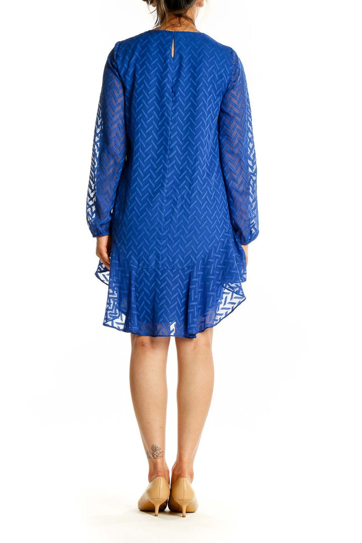 Back view of royal blue BCBG MaxAzria chevron lace cocktail dress with keyhole detail