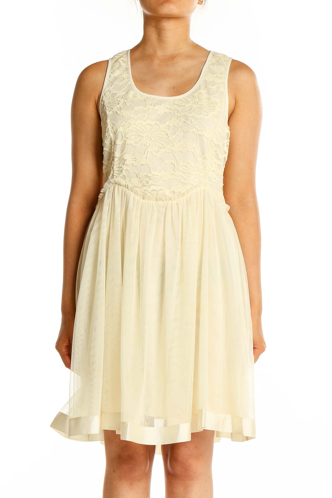 Front view of cream a'reve dress with lace bodice and flowy skirt