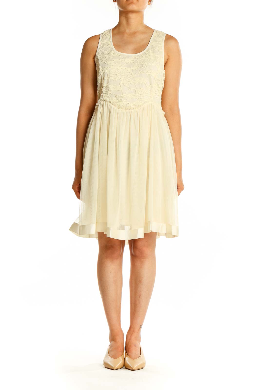 Front view of cream a'reve dress with lace bodice and flowy skirt