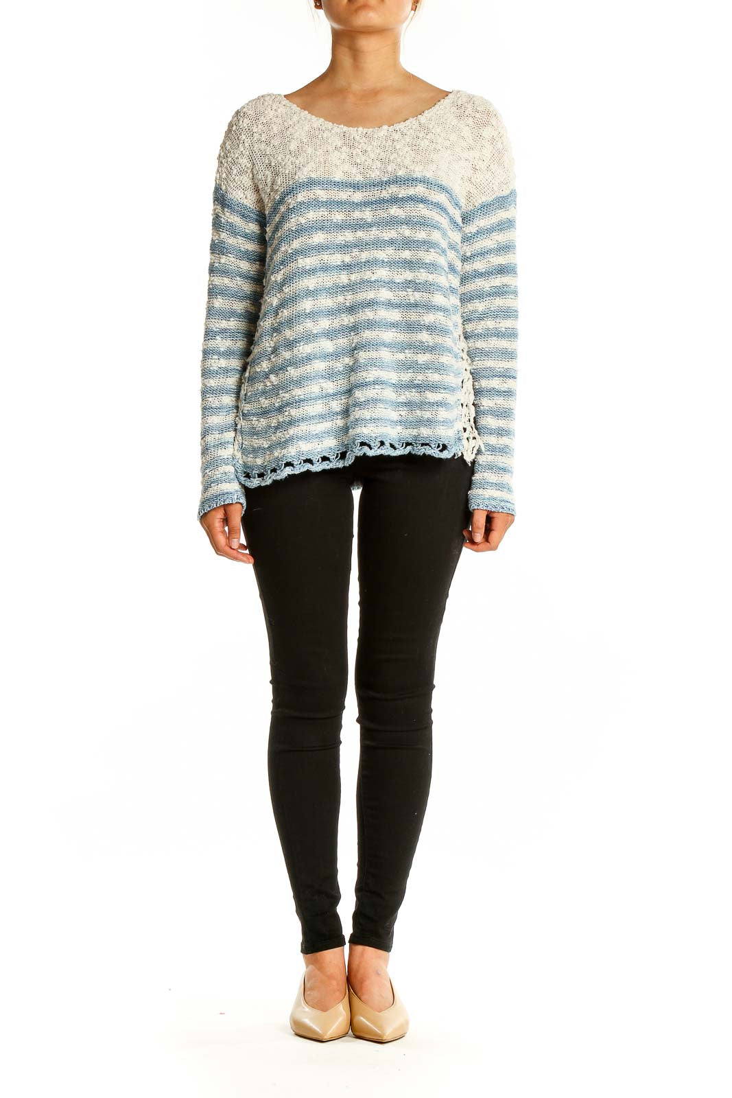 Front view of Free People blue and white striped knit sweater with scalloped hem