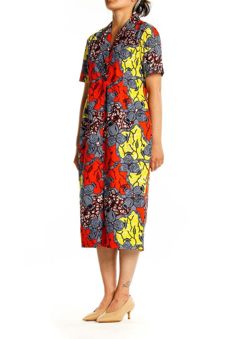 Front view of SilkRoll multicolor floral print shirt dress with red, yellow, and blue flowers