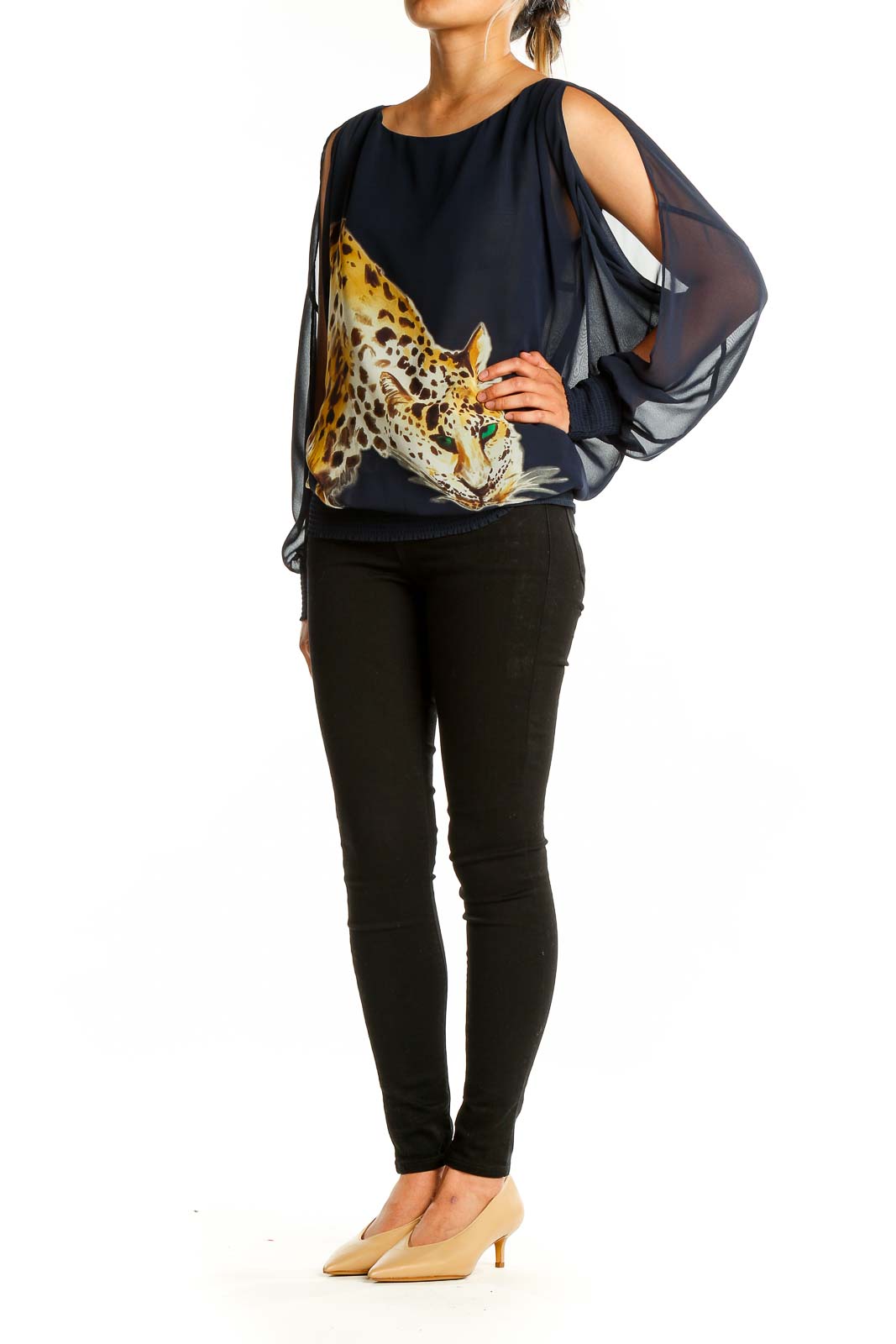 Front view of Trina Turk navy top with leopard print and sheer sleeves