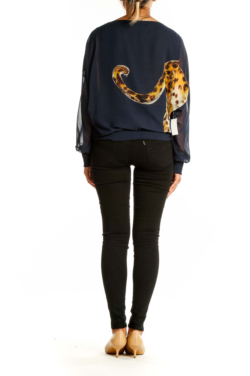 Back view of Trina Turk navy top showing leopard tail design