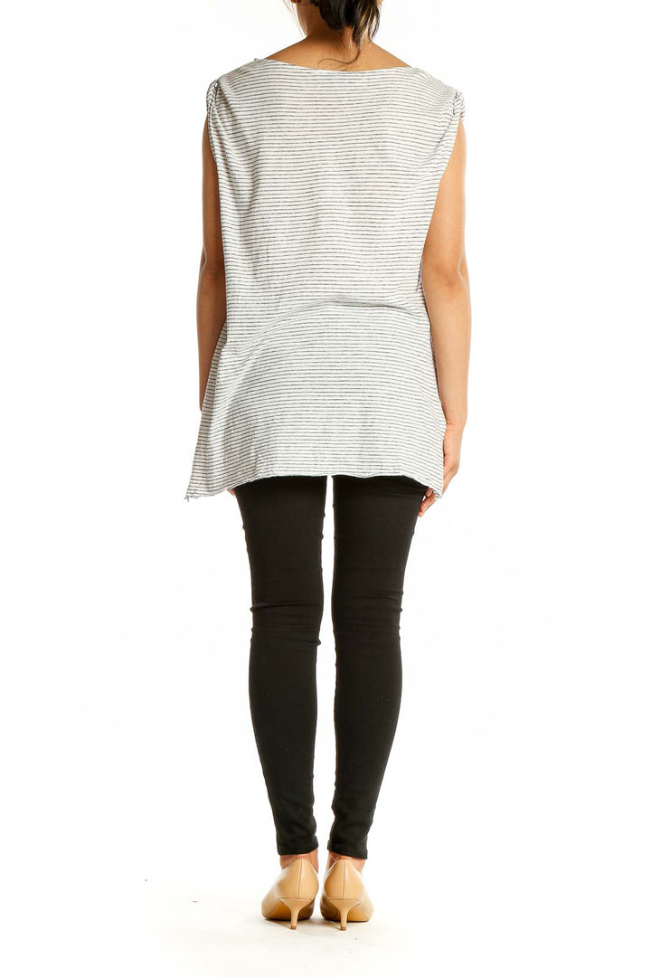 Back view of All Saints white striped sleeveless top showing relaxed fit