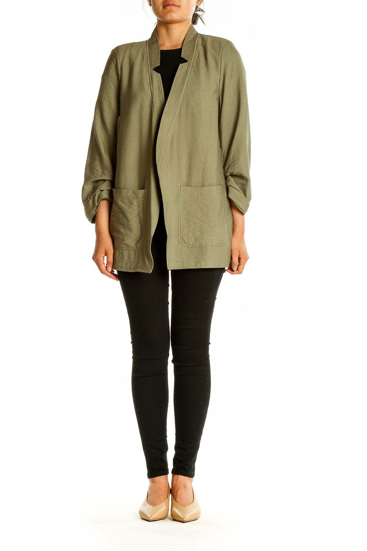 Front view of olive DKNY lightweight open-front jacket on model