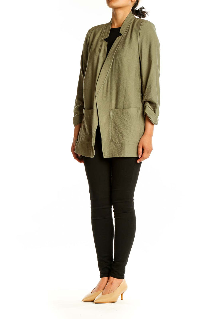 Front view of olive DKNY lightweight open-front jacket on model