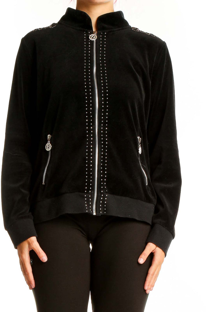 Front view of BCBGeneration black velvet bomber jacket with studded details