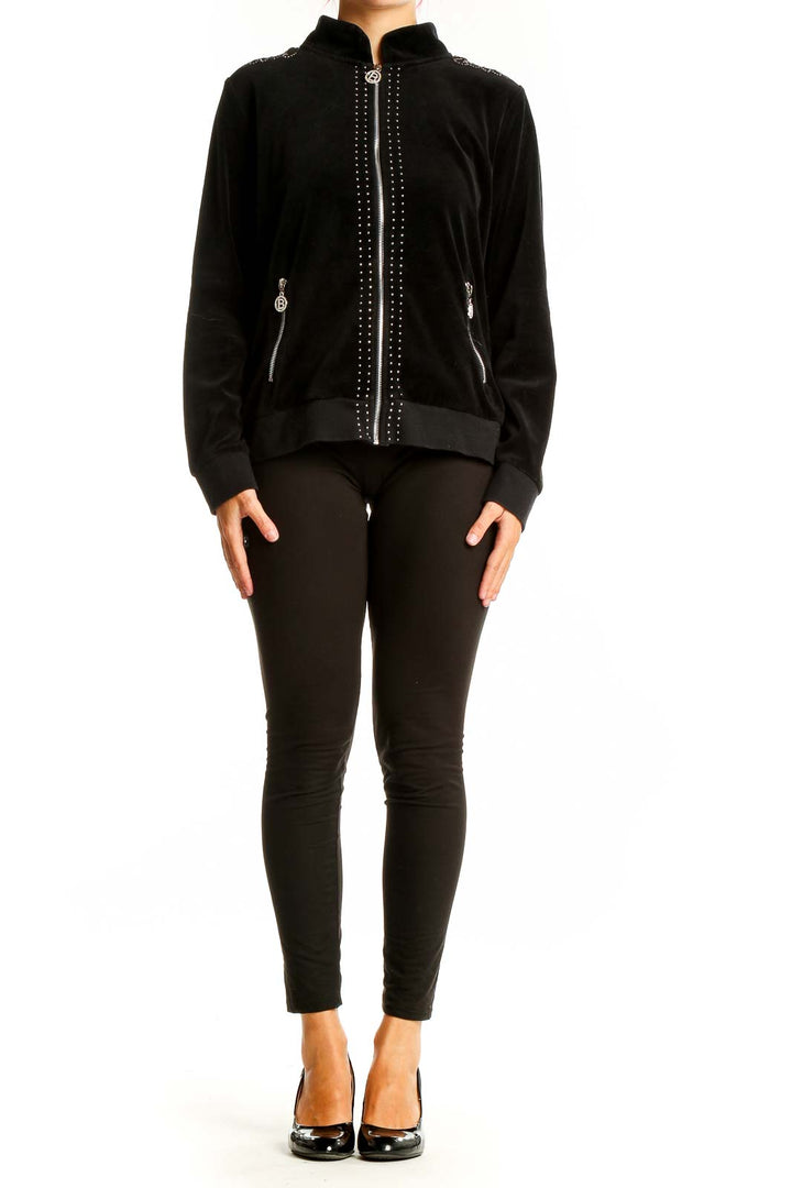 Front view of BCBGeneration black velvet bomber jacket with studded details