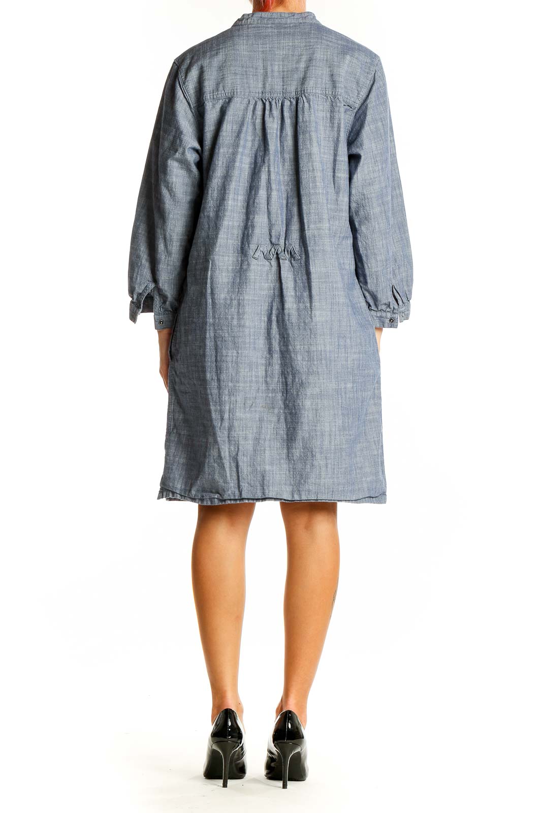 Back view of Patagonia blue organic cotton shirt dress showing gathered yoke